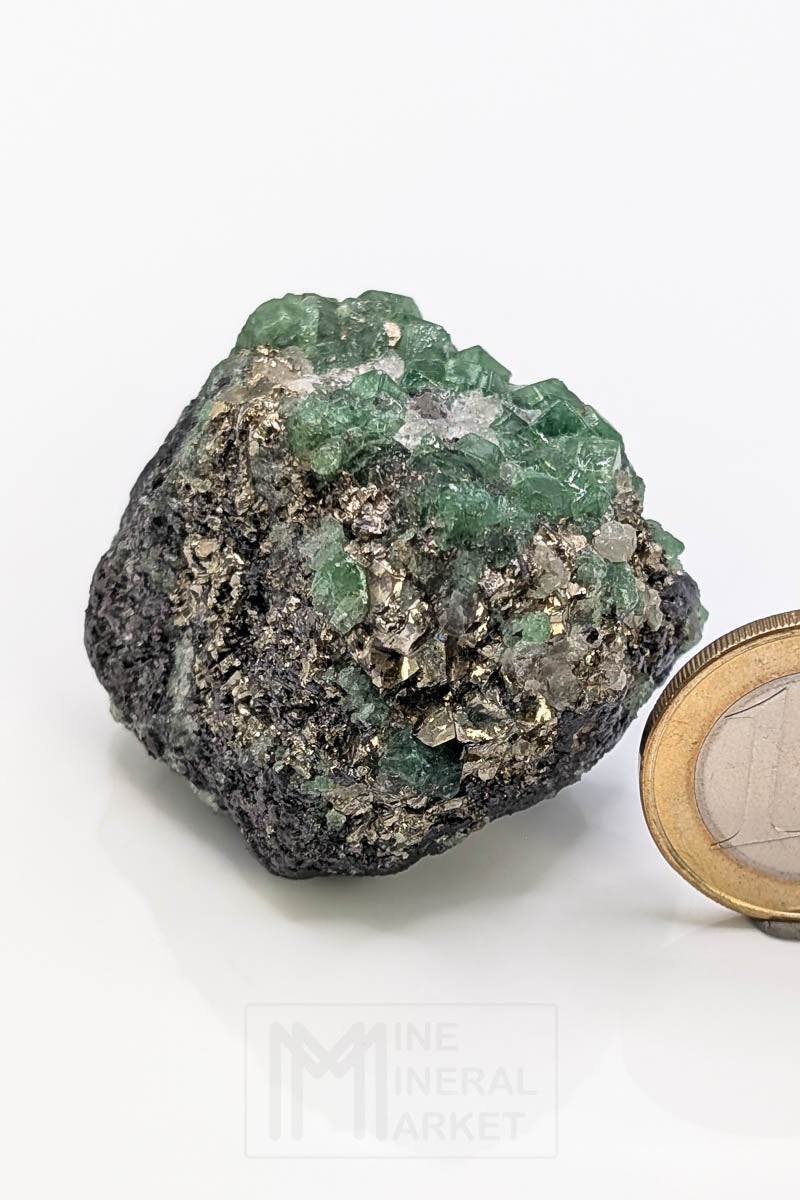 Tsavorite with pyrite