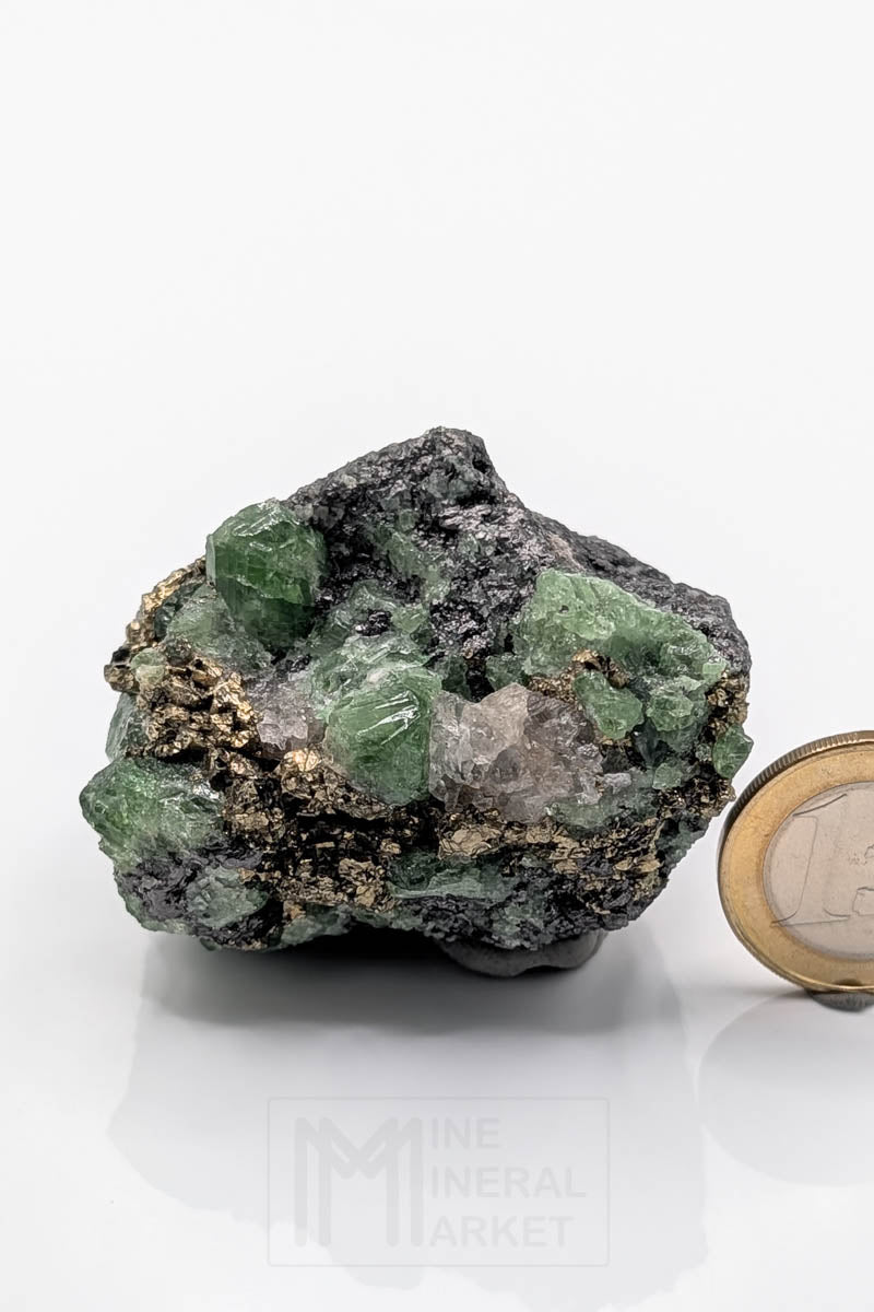 Tsavorite with pyrite